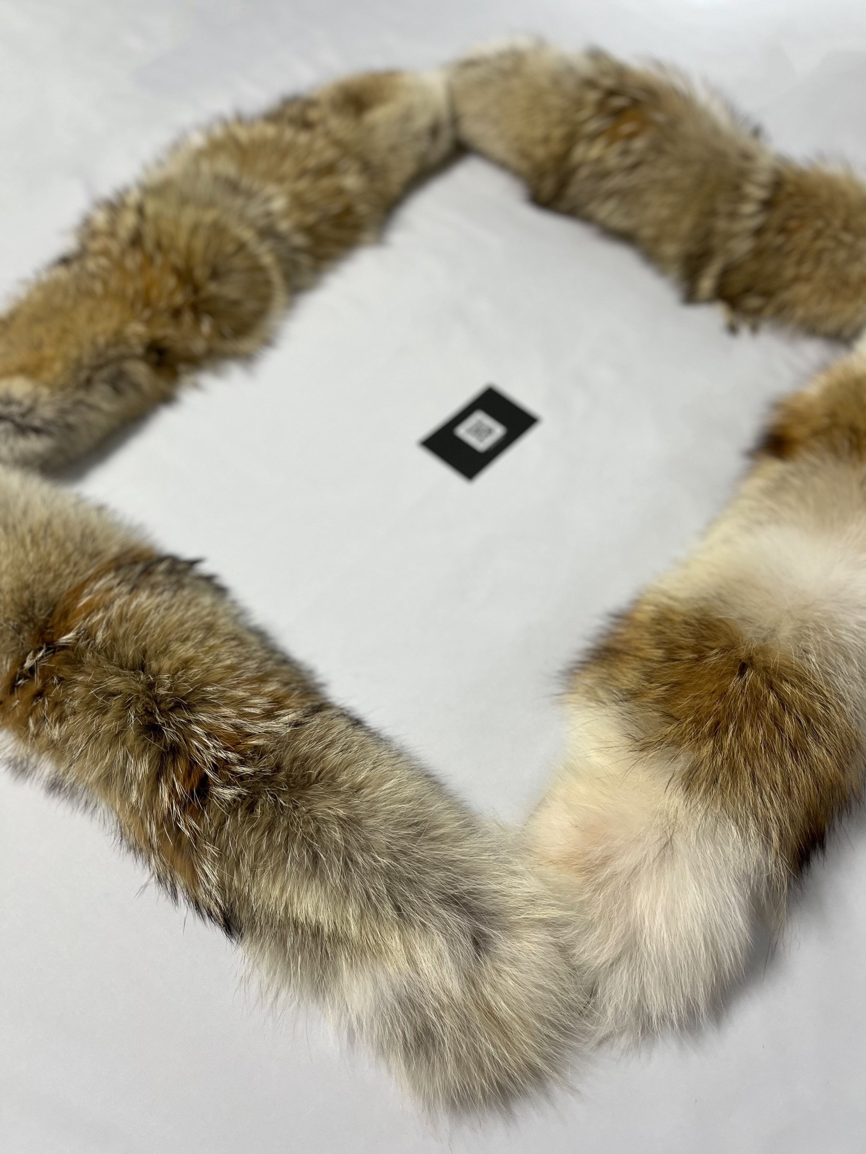 Four coyote fur hood replacement trims for Canada Goose jackets in different colors displayed together