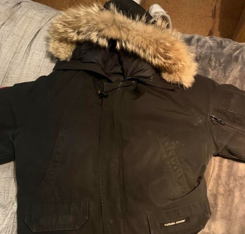 Canada Goose jacket with thin low quality fur trim on the hood